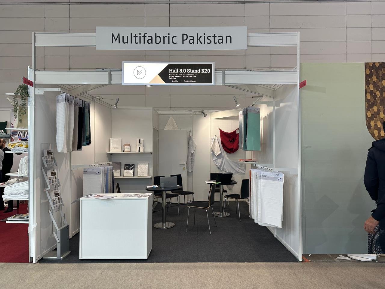 Multifabric Pakistan exhibition stand at Heimtextil, with samples and company signage